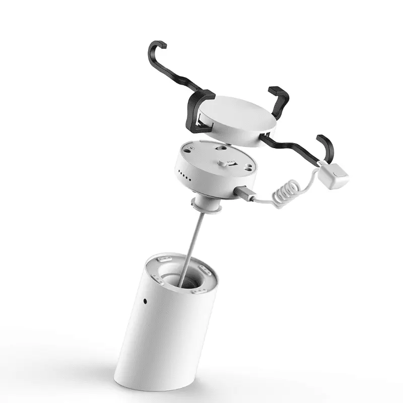Exploded view of a mobile security stand showing internal recoiler, alarm module and metal arms
