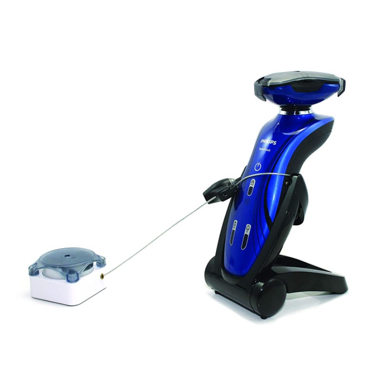 Electric shaver secured by a retractable retail display security tether